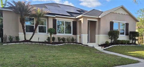 Photo of 14467 Golden Rain Tree Boulevard, Orlando, FL 32828 (MLS # O6391537)