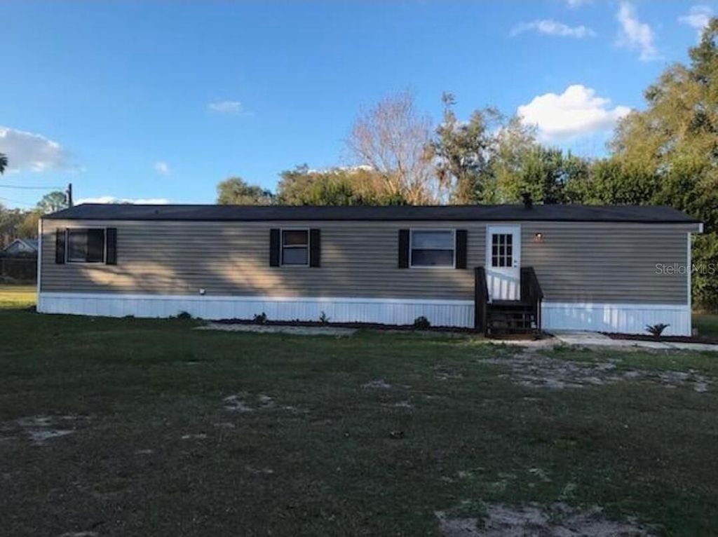 Photo of 13585 SE 119th Street, Ocklawaha, FL 32179 (MLS # O6412346)