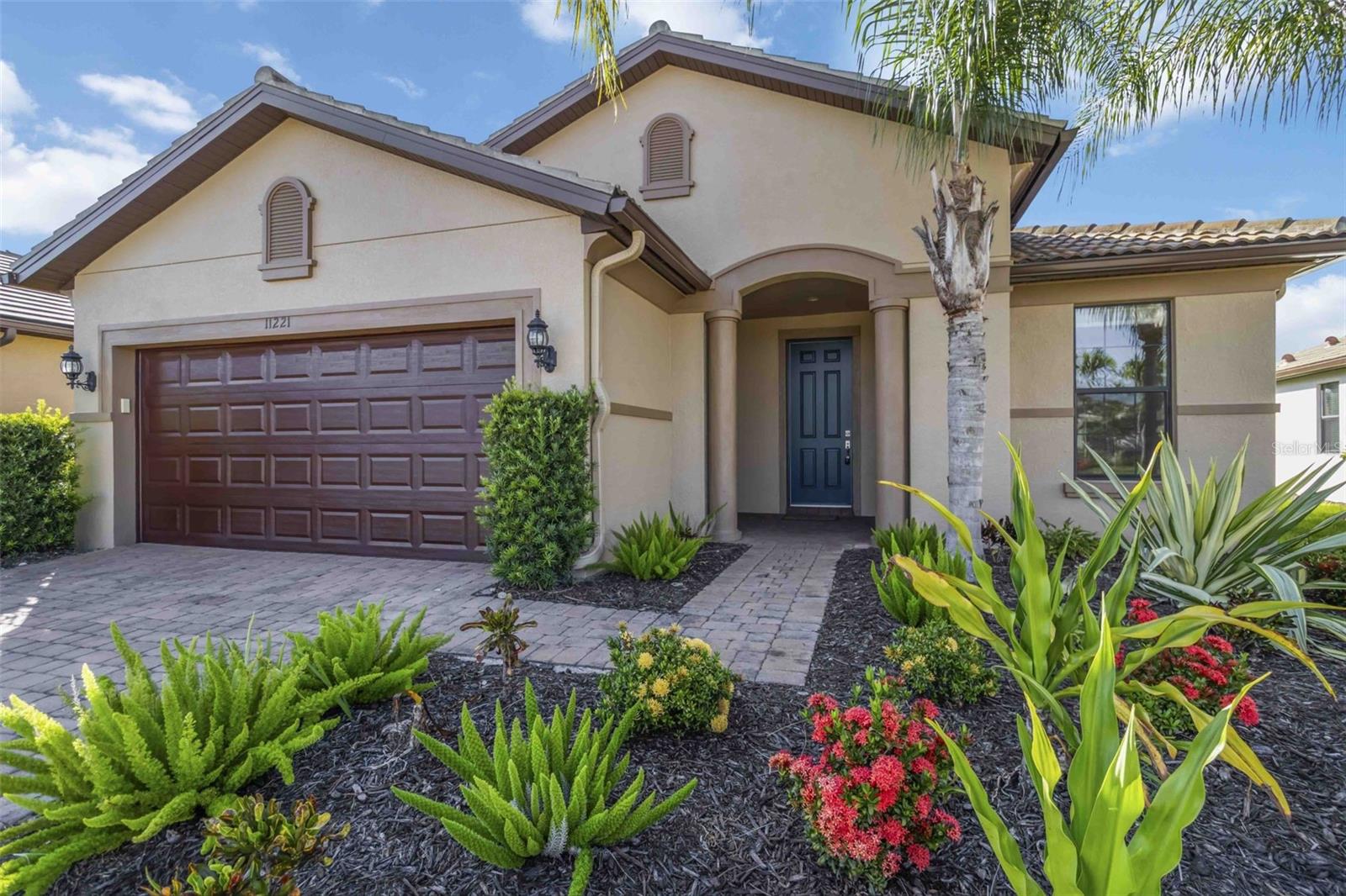 One or more photo(s) has been virtually staged. Welcome to 11221 Sandhill Preserve Drive, a stunning property located in the heart of Palmer Ranch in Sarasota, FL. The Seller has repainted exterior 05/2025, replaced the original kitchen appliances with new Whirlpool stainless appliances. New refrigerator, range, microwave, and dishwasher! This flowing floor plan residence features three bedrooms, plus a bonus office or den space, plus two bathrooms, with an open plan design that provides a spacious and comfortable living area of 2084 square feet. The property delivers a picturesque lake view from rear lanai, perfect for relaxing and enjoying the serene surroundings. You'll be greeted by a bright and welcoming entry that leads into the main living area. The open plan design of the home creates a seamless flow between the living room, dining room, and kitchen, making it perfect for entertaining guests or spending time with family. The living room features large windows that offer plenty of natural light and a nice view of the lake. The kitchen is equipped with modern appliances, ample granite counter space, a breakfast bar area, making it ideal for preparing meals and hosting gatherings. The master bedroom is spacious and comfortable, with a large window that offers a stunning view of the lake. The master bathroom features a walk-in shower, double sinks and a generously sized closet and extra storage. The two additional bedrooms are also spacious and comfortable, with plenty of closet space and large windows that offer plenty of natural light. The second bath delivers a combination shower/soaking tub too. This home is within a short walking distance to community amenities. The resort-styled amenity center features a heated pool, hot tub/spa, tennis courts, fitness center, firepit, cabana, and meeting rooms. The community also has an onsite activity director who organizes great social events for residents, making it easy to meet new people and make new friends. For those who enjoy walking and exploring the outdoors, there are walking paths throughout the community that offer stunning views of the lake and surrounding landscape. The community is also conveniently located near some of the best shopping, dining, and entertainment options in Sarasota, making it easy to enjoy all that the city has to offer. The Publix grocery store is located within walking distance, and Costco is only 2 miles away! There is also easy bike ride to access Legacy Trail, an 18.5 mile scenic walking/biking path that travels from Sarasota to Venice, FL. This is a beautiful property in a great gated and secure community offering a luxurious and comfortable lifestyle with a peaceful and welcoming community. Schedule an appointment to see what could be your next new home. VIDEO: https://youtu.be/oZ9OpLFYa-k