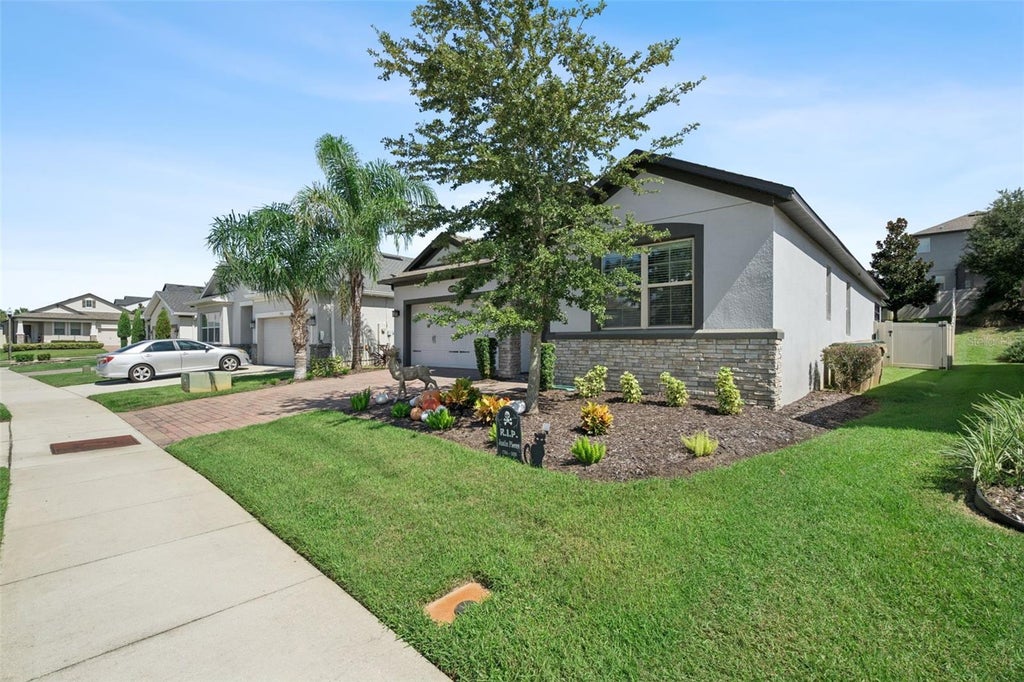 Photo of 13322 Blossom Valley Drive, Clermont, FL 34711 (MLS # O6449887)
