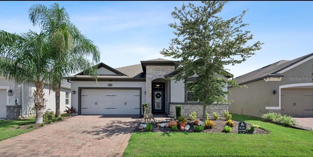 Photo of 13322 Blossom Valley Drive, Clermont, FL 34711 (MLS # O6449887)