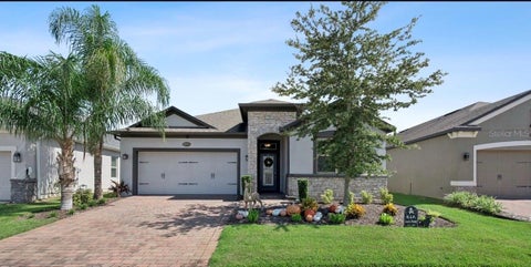 Photo of 13322 Blossom Valley Drive, Clermont, FL 34711 (MLS # O6449887)