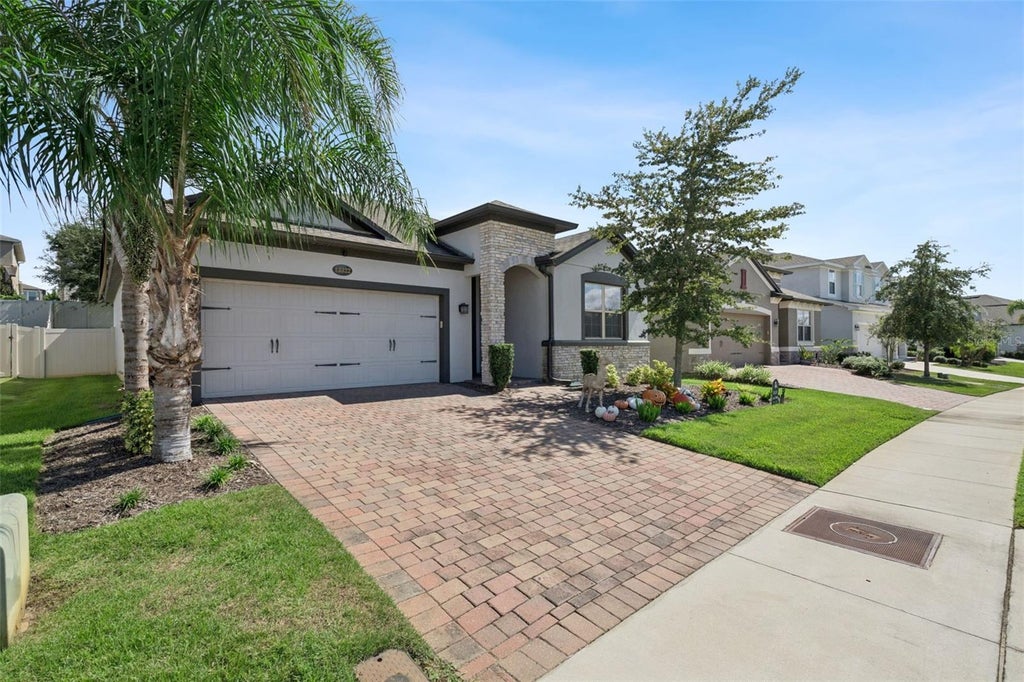 Photo of 13322 Blossom Valley Drive, Clermont, FL 34711 (MLS # O6449887)
