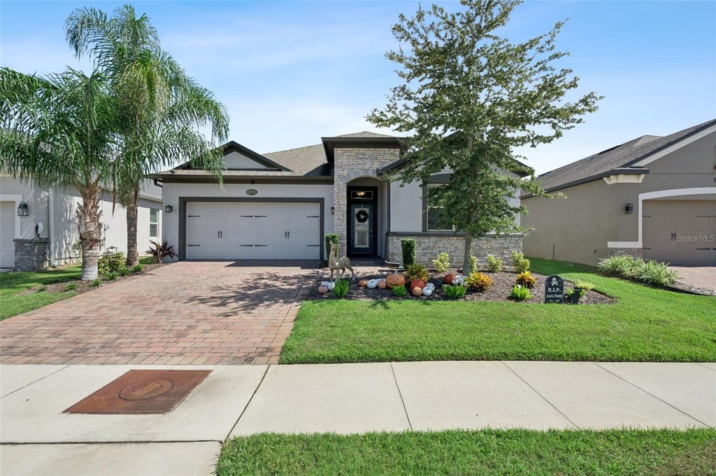 Photo of 13322 Blossom Valley Drive, Clermont, FL 34711 (MLS # O6449887)