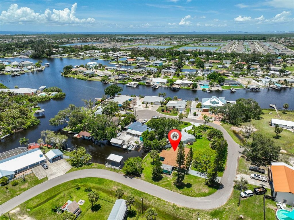 Photo of 301 Carlyle Boulevard, Ruskin, FL 33570 (MLS # TB8396429)