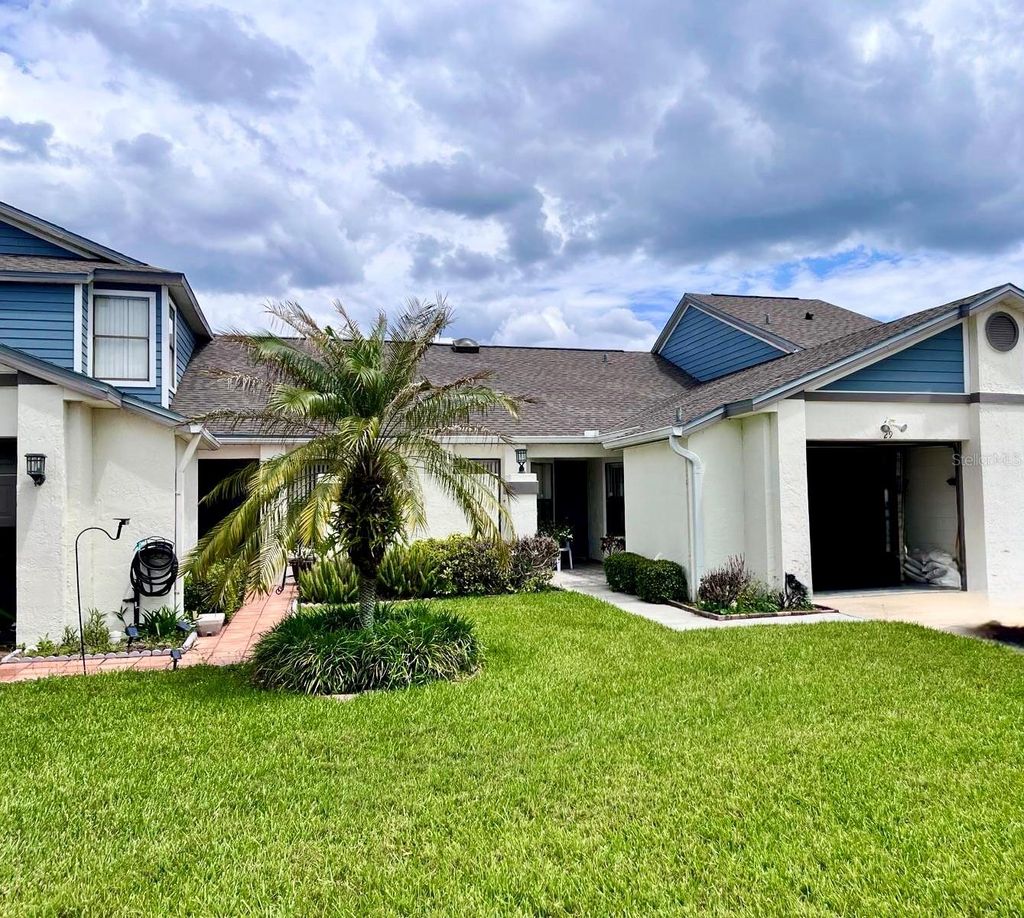 Photo of 29 Lakepointe Circle, Kissimmee, FL 34743 (MLS # O6401959)