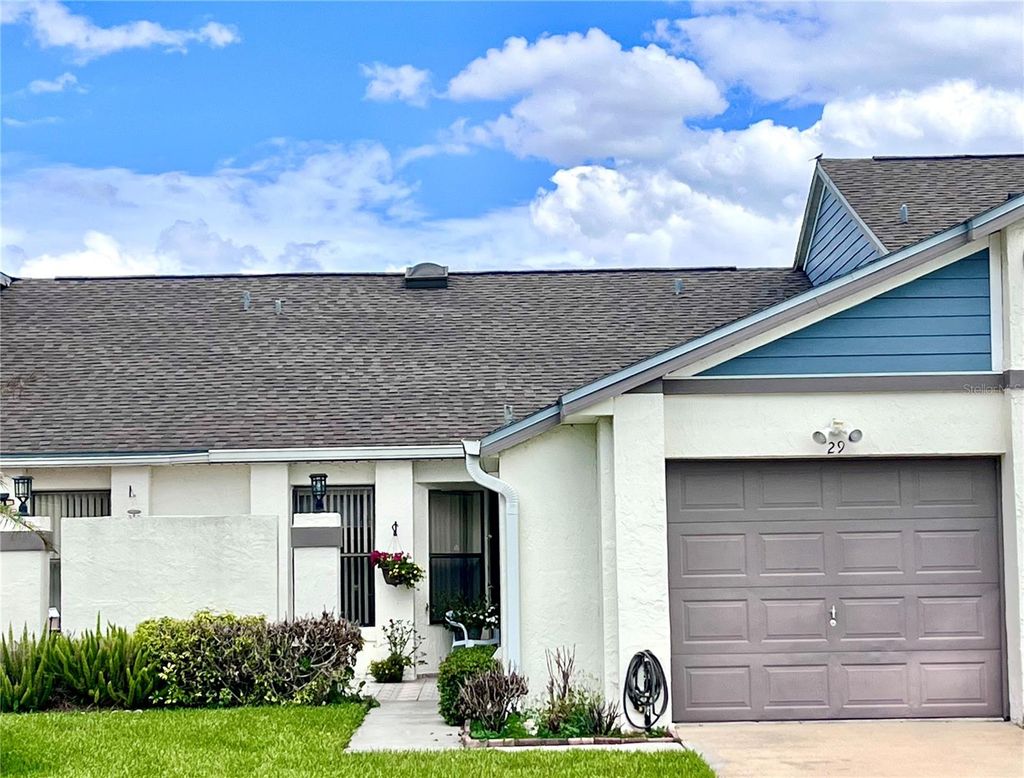 Photo of 29 Lakepointe Circle, Kissimmee, FL 34743 (MLS # O6401959)