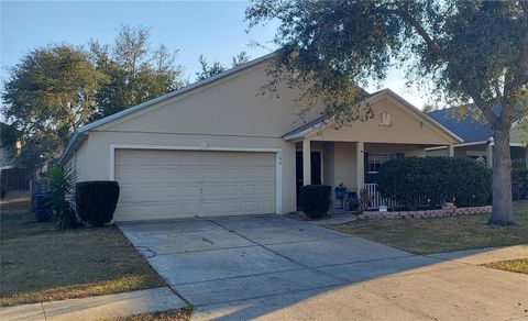 Photo of 1124 Bluegrass Drive, Groveland, FL 34736 (MLS # O6384215)