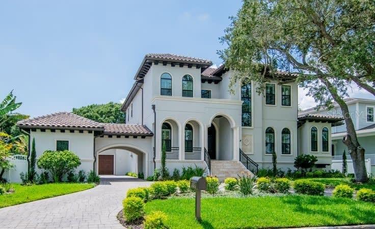A beautiful custom Taralon home located in the heart of Sunset park. This 2015 upscale build was designed to be an open floor plan with spacious living areas and the perfect environment for large scale entertaining. This homes exterior features include a unique porte-cache with oversized 3 car garage, massive rear lanai with fireplace, custom wrought iron doors, and salt water pool and spa. The first floor includes a formal dining room, game room, office nook, spacious owners retreat, laundry room, mudroom, gourmet kitchen and large family room. Some custom features of the primary level include a 2 story foyer, oversized his and her closets, Restoration Hardware light fixtures, custom marble fireplace and butlers pantry with wine fridge and built in nugget ice maker. The second floor includes 3 large en-suite bedrooms and a beautiful oversized laundry room. This is a stunning home and a great opportunity to live in the most desireable neighborhood without the wait of new construction.