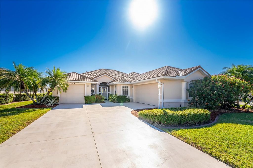 Photo of 7078 S Lake Drive, Englewood, FL 34224 (MLS # D6144352)