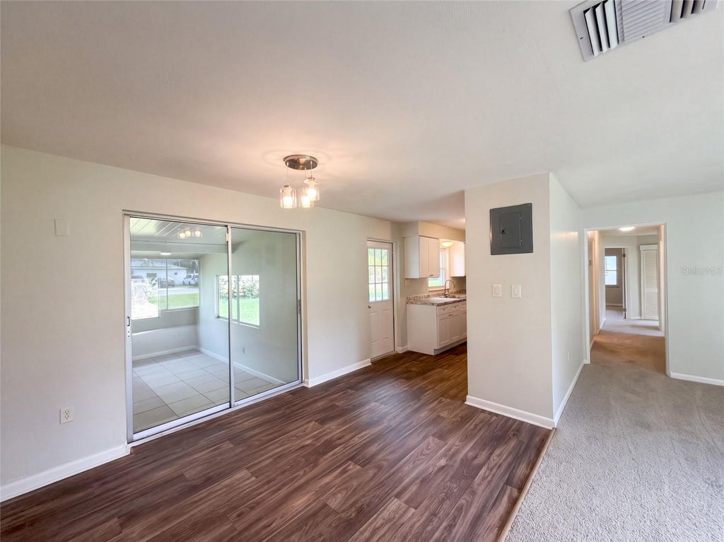 Photo of 411 W Seminole Avenue, Eustis, FL 32726 (MLS # O6446227)