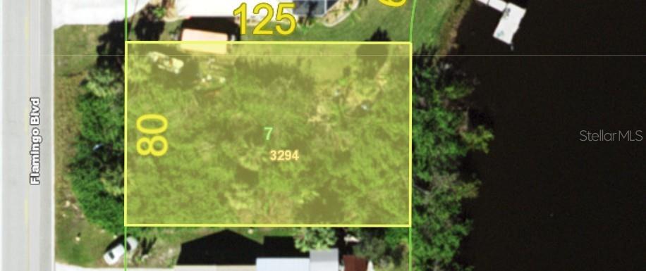 Beautiful buildable lot with access to Charlotte Harbor and the Gulf of America. This lot has 80 feet of frontage on the Como Waterway in your backyard. Public sewer and public water are required. Centrally located in Port Charlotte, FL, 7 minutes from the Tampa Bay Rays Spring Training. Close to shopping, restaurants, numerous beaches and parks, it has great access while remaining secluded and surrounded by nature. Get your slice of Florida paradise.