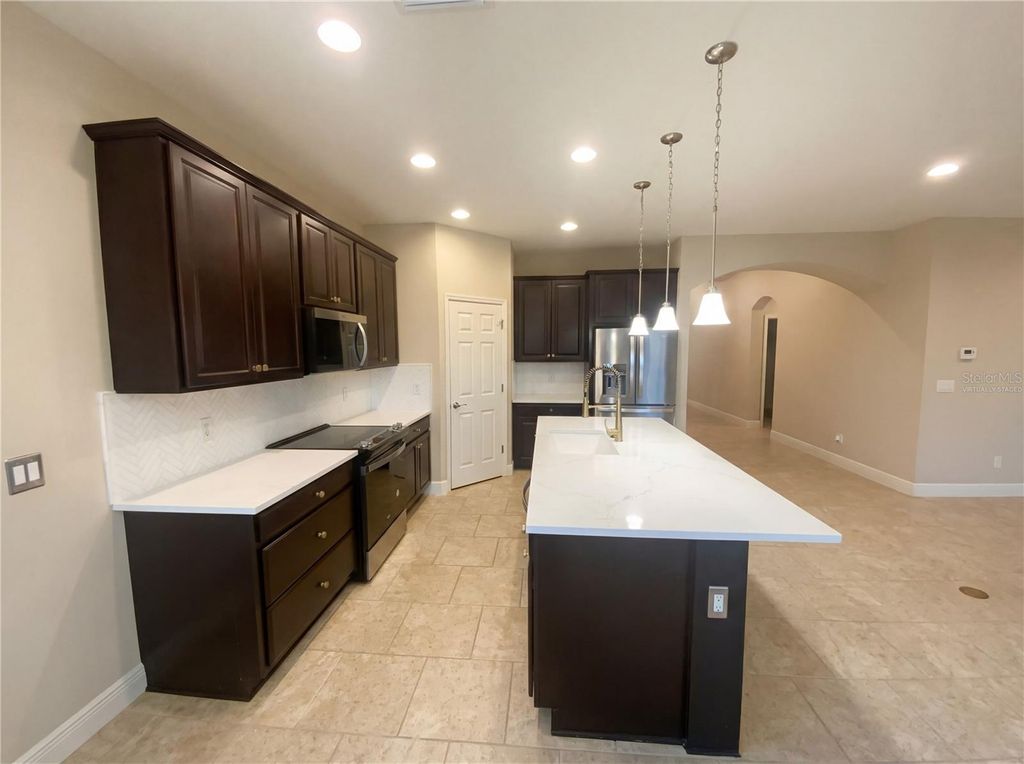 Photo of 32395 Natural Bridge Road, Wesley Chapel, FL 33543 (MLS # O6382118)