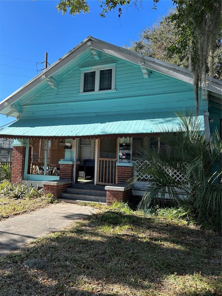 Investment property. Approximately 1/2 mile from UF Campus. Front house is 1/1 on each side. Back of property has an upstairs 1/1 and downstairs has 1 room open plan