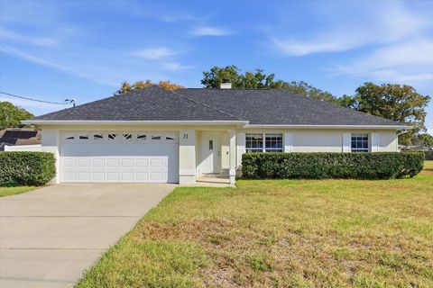 Photo of 31 Banyan Pass Loop, Ocala, FL 34472 (MLS # TB8451589)