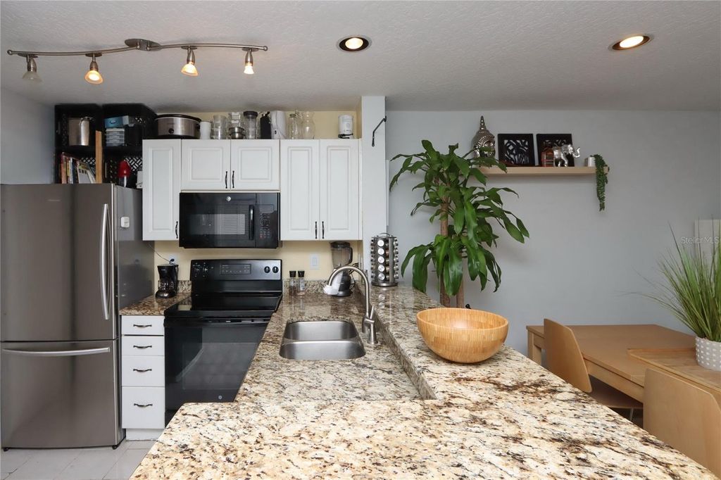 Photo of 10110 Winsford Oak Boulevard #618, Tampa, FL 33624 (MLS # TB8446924)