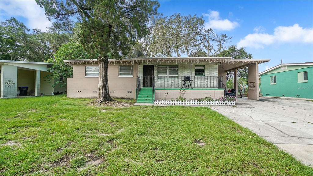 Photo of 5518 Riviera Drive, Orlando, FL 32808 (MLS # O6434894)