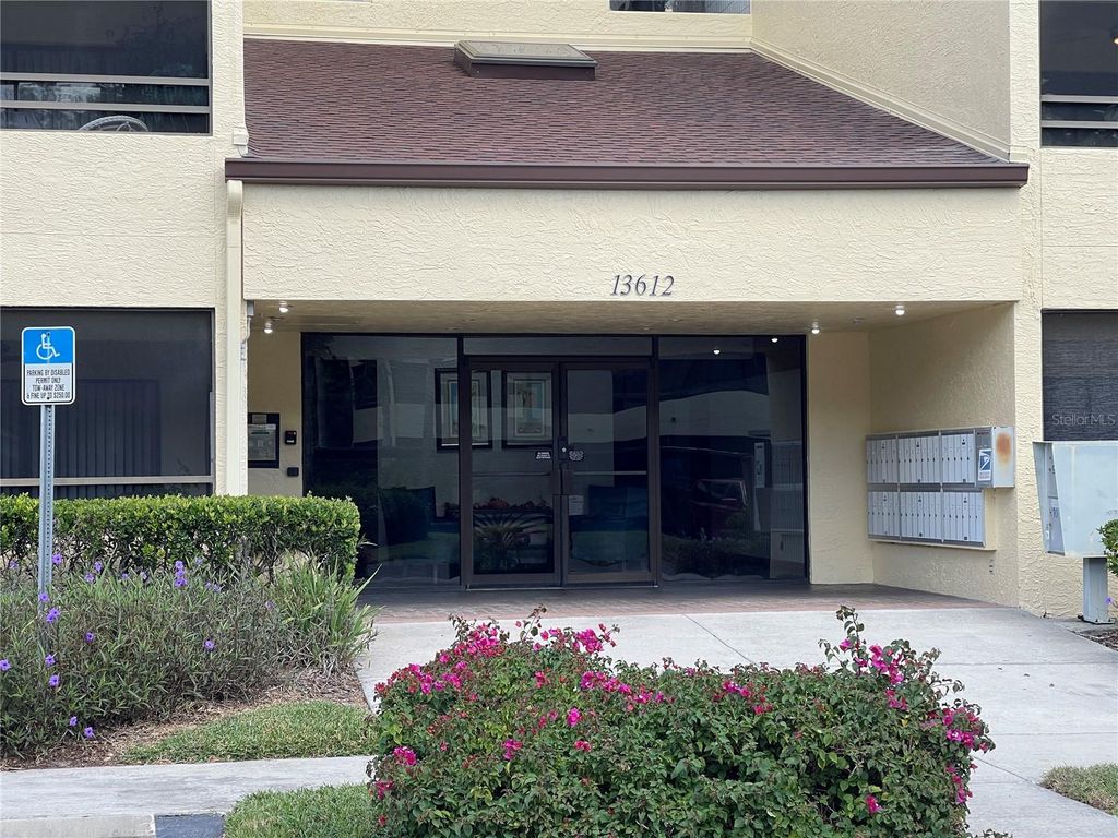 Photo of 13612 S Village Drive #108, Tampa, FL 33618 (MLS # TB8438993)