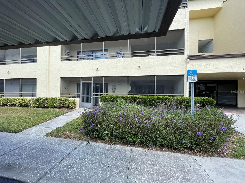 Photo of 13612 S Village Drive #108, Tampa, FL 33618 (MLS # TB8438993)