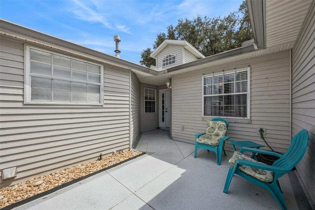 Photo of 26032 Newcombe Circle, Leesburg, FL 34748 (MLS # G5117682)
