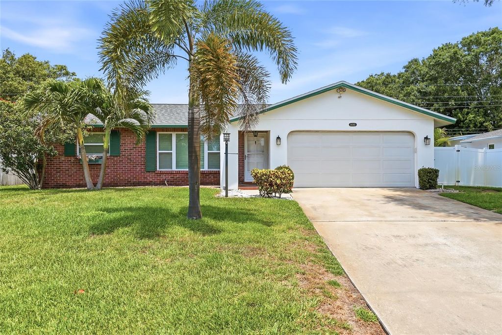 Photo of 14161 Hetrick Circle N, Largo, FL 33774 (MLS # TB8511957)