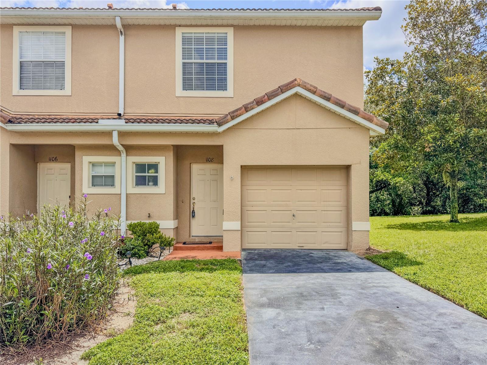 Charming 3-Bedroom Townhome in Apopka in Errol Estates.
Welcome to this beautifully maintained 3-bedroom, 2.5-bath townhome nestled in a quiet community near the desirable Errol Estates area of Apopka. With an open and inviting floor plan, this home offers both functionality and style.
Step inside to find durable tile flooring throughout the first floor, complemented by elegant iron rod stair railings leading to the second level, where you'll find stunning rosewood wood floors. The entrance hallway flows seamlessly into a spacious open-concept great room, with a formal dining area to the left and a well-equipped kitchen to the right.
The kitchen includes all major appliances white range, dishwasher, and microwave along with a sleek stainless steel refrigerator. Enjoy the convenience of a pantry and a downstairs storage closet for added functionality. Just off the living area, step outside to a charming open & private with no rear neighbors, pavered patio perfect for relaxing or entertaining.
Upstairs, all three bedrooms are thoughtfully positioned for privacy. The large master suite boasts soaring ceilings and a full en-suite bath with a shower/tub combo. The second bedroom is perfect for guests or family, featuring two separate closets ideal for a "his and hers" setup and direct access to the second full bath, also with a shower/tub combo. The third bedroom makes a perfect home office, nursery, or guest room. A linen closet is conveniently located in the upstairs hallway.
Additional features include a durable tile roof and a prime location in Apopka, a rapidly growing city known for its natural beauty, parks, and proximity to major highways, making commuting to Orlando or the surrounding areas a breeze.
Top-Rated Schools: Zoned for schools rated A and B as of 2024 (buyers should verify school zoning as it may change).
Don’t miss the opportunity to own a move-in ready home in one of Apopka’s most sought-after communities. Schedule your private showing today!