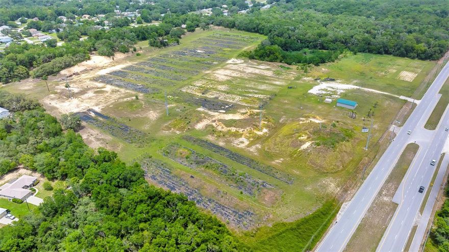 Don’t miss this rare opportunity to acquire 26± acres of vacant land in a rapidly expanding growth corridor with AADT: 17,900. Perfectly positioned adjacent to major new residential and commercial developments, this property offers incredible potential for a wide range of uses including retail, multifamily, mixed-use, or light industrial (subject to zoning). With excellent visibility and access, this high-traffic location is primed for investment. Utilities are near which allows for easy development. Whether you’re looking to capitalize on the booming area growth or secure land for future expansion, this property checks all the boxes. Property has 4 wells and plenty of infill dirt. This property is predominantly zoned MDR MH (Medium Density Residential) with the approx.100 ft access area zoned GNC (General Commercial)