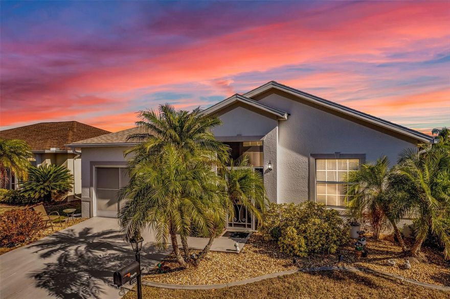 STUNNIG SHEFFIELD with HIGH ceilings in the gated golf course/active resort of highly desirable Kings Gate, a 55+ community that is NOT in a flood zone and DOES NOT require flood insurance.  This TURNKEY (with a few exceptions) home has been nicely updated including 2023 roof, 2018 AC, HWH 2020, freshly painted exterior, accordion shutters for enclosed lanai and rest of house with hurricane impact windows.  Tile throughout the main living area with LVP in master and den.  Step inside this extremely well maintained home and you'll notice the high ceilings before bringing your gaze to the SPACIOUS living room and then that EXPANDED and ENCLOSED lanai.  Great options for entertaining and/or relaxation.  Master bedroom with his/her walk in closets and dual vanities located in back left of home with guest bedroom/bathroom in the front right of home - providing tremendous PRIVACY for both you and your guests. Kitchen has corian counters - decorative back splash and new SS refrigerator + induction stove.  Great location in community - very close to front gate.   And if you haven't been to Kings Gate before - you're going to love the options for activity (Olympic size heated swimming pool and spa, tennis courts, pickle ball, lawn bowling, shuffle board, bocce, horseshoes, gym, billiards, library, euchre, bingo, bridge, Texas hold em, poker, mahjong and more).  The onsite AND NEWLY REMODELED Lions Den restaurant and bar is super convenient and also offers Tuesday night Karaoke and monthly trivia contests. Many residents love the fact that they are just a golf cart ride away from the shopping plaza that provides you access to grocery store (ALDI), drug store, bank, restaurants and shopping.  Want to explore outside of Kings Gate – you are minutes away from the restaurants and shops of downtown Punta Gorda and Fisherman's village. And if you want to explore more of Florida's fun spots you’re near I75 to quickly head north or south. An AMAZING TURNKEY home with tons of UPDATES in a PREMIER gated community needs a look.  Call today for a private showing and a golf cart tour of the community/amenities.