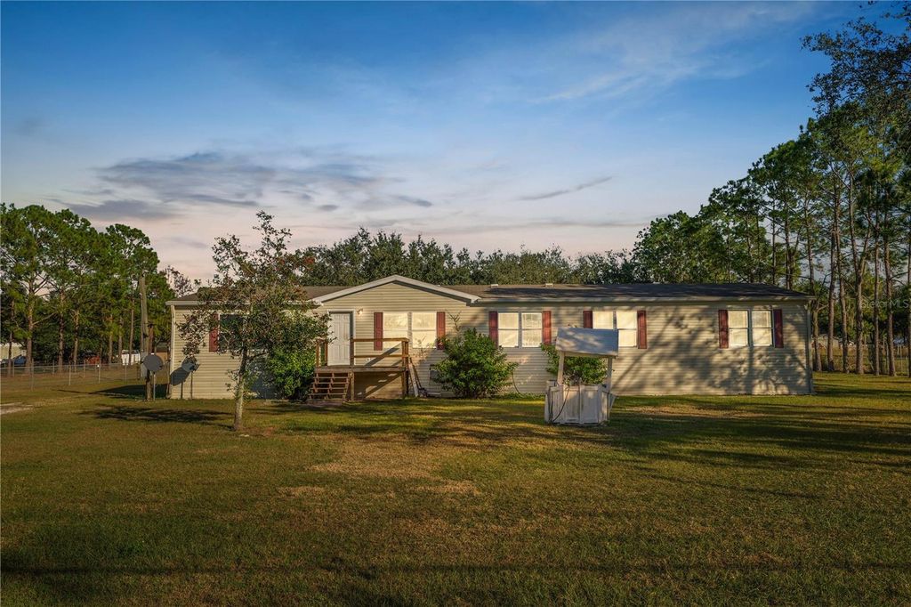 Photo of 11516 Tuten Loop, Lithia, FL 33547 (MLS # L4957835)