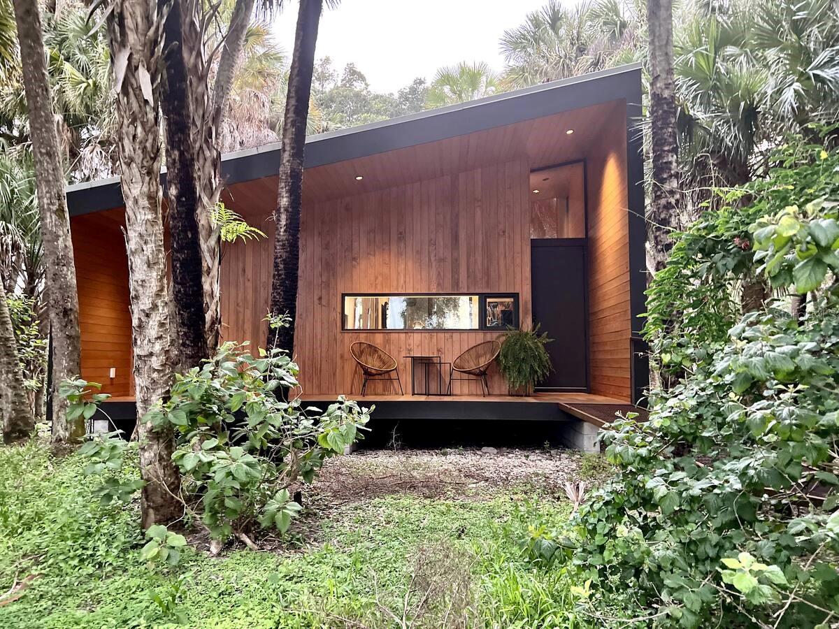 Tranquility awaits as you take your morning sips of coffee admiring the cows & baby bull on the back pasture. Absolute comfort awaits in this award winning modern cabin in the woods! Crisp organic sheets and feather duvet to tuck you in at night in the coziest pillow top mattress - for your heavenly night. There is a queen pull out bed in the living room with a mattress topper. An additional air mattress can be set up in the screened porch. Gourmet kitchen-reach for it, and it's there. Excellent WIFI and Smart TV-for your Florida Farm retreat. Large rear screened in porch with sky high windows to take in the beauty and stillness of the pasture. The perfect place to take in the sunset and quiet of the evening. A wood burning fire pit and chairs are available for you to enjoy the nights sky.
Freshly filtered reverse osmosis water is at each tap in the cabin (sinks, shower, etc). Only organic cleaning products and shampoos - so you can expect a fragrance and chemical free truly nature loving retreat!
Beach chairs, a cooler and a beach blanket in the utility room are available for your Nokomis Beach Adventure just 15 min away.
Ninja course and hammock in the field to enjoy- also hanging trapeze bars and ladders as well that serve nicely as a place to play.
Feel free to walk in the fenced in paddock beside the barn and hang out with the cows, ducks, sows and piggies!
Pastoral getaway in the palms-come join us for an adventure like no other.
Pets welcome with prior approval.
It’s important to note that all of our animals free range on our land (ducks chickens and piglets) and some stay in their field - our two cows Herschible and Ginger.