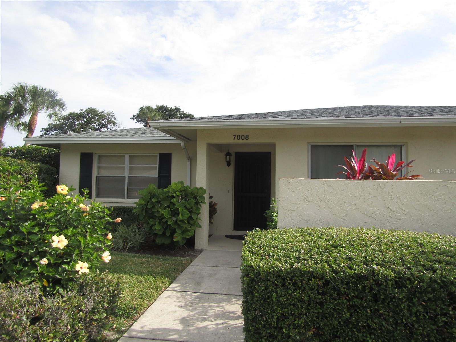 ***AVAILABLE 2026 SEASON*** Great vacation destination - this 2-bedroom 2 bath end unit condo is just waiting for you. Kitchen has been updated with Quartz counter tops. Tastefully decorated and graciously appointed, the master bedroom has a Queen bed, the second bedroom has a Queen pull out sleeper sofa for those occasional guests. Kitchen has a cute breakfast nook for enjoying your morning coffee/tea and paper. Lanai is screened and with a patio area beyond the lanai that is great for a small barbeque grill. This is a no pet and no smoking property, is available for off season rentals. Conveniently located within walking distance to the heated community pool.