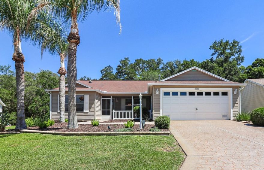 Welcome to 16856 SE 96th Chapelwood Circle in the heart of The Villages — an exceptional home offered at only $300,000 that combines privacy, comfort, and Florida lifestyle living. Nestled on a rare oversized lot with NO REAR NEIGHBORS, this beautifully maintained property features a HUGE BACKYARD with plenty of ROOM FOR A POOL, create an outdoor oasis, or simply enjoy the peaceful open space behind the home.
Step inside and immediately appreciate the spacious feel created by soaring vaulted ceilings and brand-new transitionless luxury vinyl plank (LVP) flooring that flows seamlessly throughout the entire home. The open and inviting layout offers both elegance and functionality, perfect for entertaining guests or enjoying relaxed everyday living.
The OVERSIZED SCREENED BIRDCAGE extends directly from the covered lanai, creating an incredible indoor-outdoor living experience ideal for morning coffee, evening gatherings, or soaking in Florida’s year-round sunshine. The professionally designed hardscape adds curb appeal and enhances the outdoor ambiance, while the screened front porch offers yet another tranquil place to unwind.
Inside, the FLORIDA ROOM provides additional versatile living space that can be used as a sitting area, hobby room, office, or entertainment space. The spacious primary suite is designed for comfort and convenience with TWO walk-in closets and a newly upgraded primary bathroom shower featuring a sleek frameless glass door for a luxurious modern touch.
Located in one of the most sought-after active adult communities in Florida, this home places you close to golf, recreation centers, shopping, dining, entertainment, and everything that makes life in The Villages so desirable. Whether you’re searching for a seasonal retreat, investment opportunity, or full-time Florida residence, this move-in ready gem delivers exceptional value, privacy, and lifestyle at an unbeatable price.
Conveniently located near some of the area’s most popular amenities, residents are just minutes from Mulberry Grove Recreation Center and FIRST RESPONDERS RECREATION CENTER for pools, pickleball, activities, and social events. Shopping and dining are nearby at Mulberry Grove Plaza and Magnolia Plaza, while healthcare access is conveniently close with The Villages VA Clinic just a short drive away.
ROOF 2012, AC 2023, HWH 2018