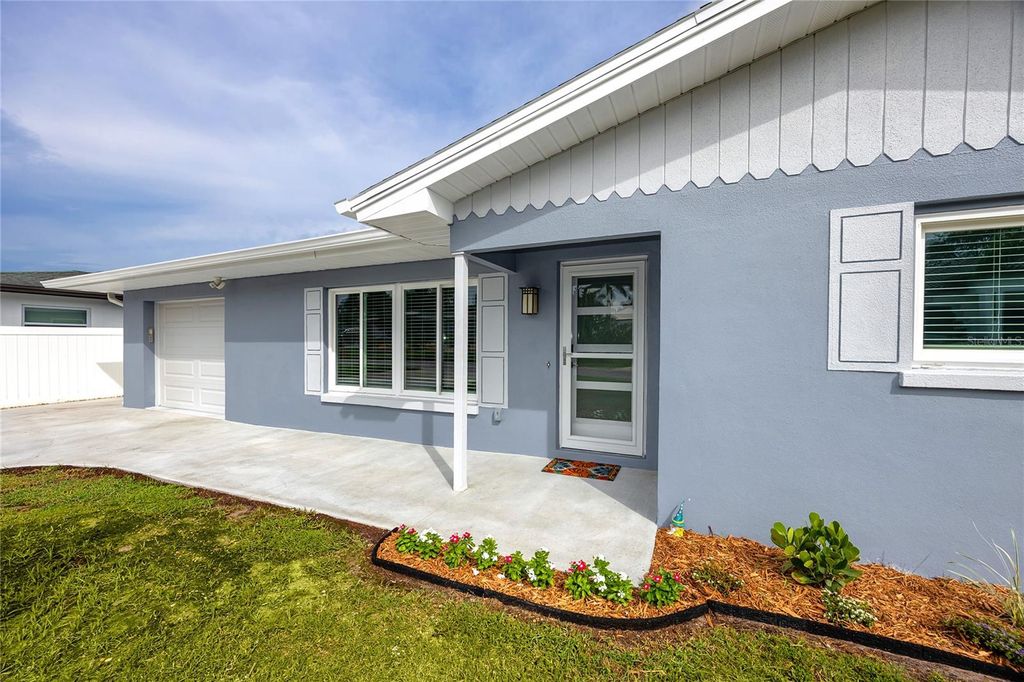 Photo of 2597 Crescent Drive, Largo, FL 33770 (MLS # TB8487724)