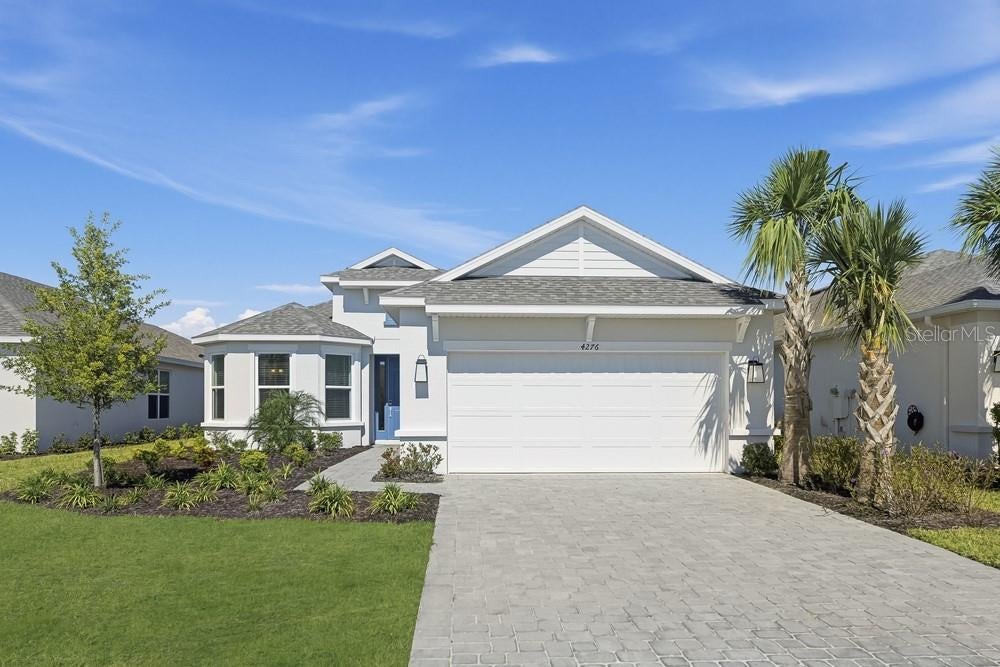 Photo of 4276 Barbuda Lane, Kissimmee, FL 34758 (MLS # O6450079)