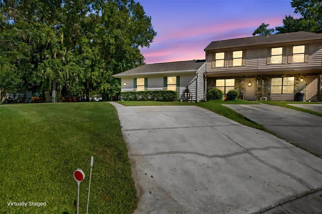 Photo of 828 Village Drive, Brooksville, FL 34601 (MLS # W7889764)