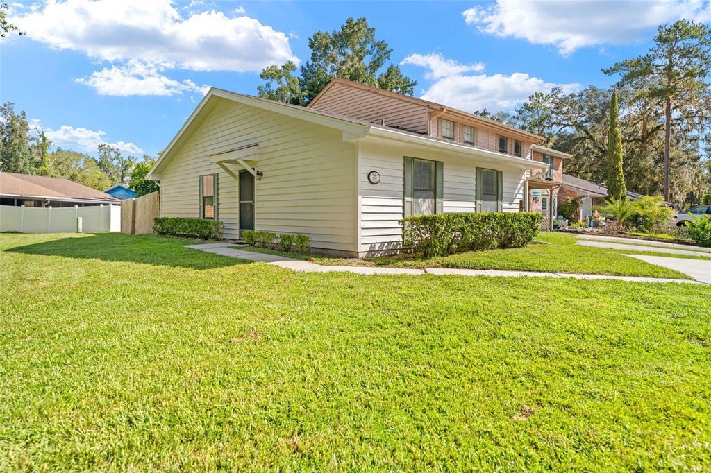 Photo of 828 Village Drive, Brooksville, FL 34601 (MLS # W7889764)
