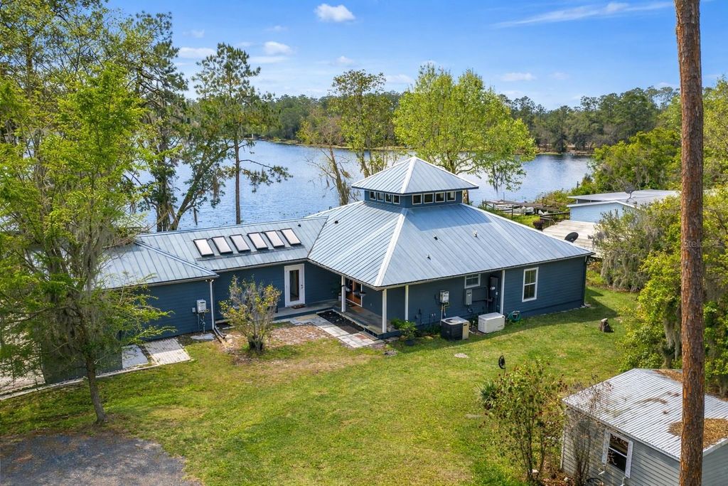 Photo of 299 Riley Lake Drive, Hawthorne, FL 32640 (MLS # GC538917)