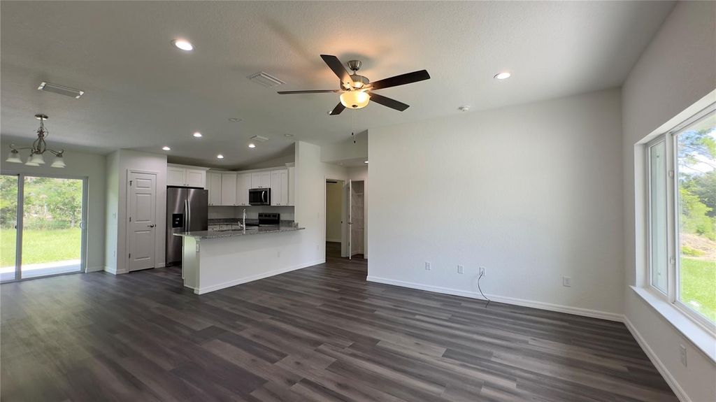 Photo of 122 Malauka Loop, Ocklawaha, FL 32179 (MLS # O6366237)