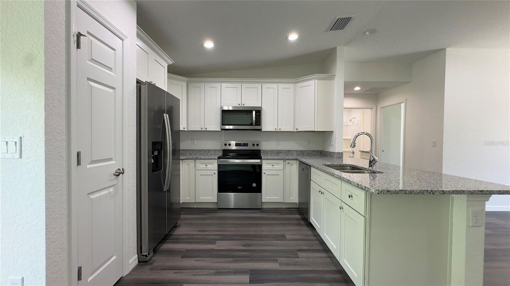 Photo of 122 Malauka Loop, Ocklawaha, FL 32179 (MLS # O6366237)