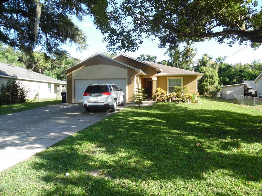 Enjoy the best of both worlds with this well-maintained 3 bedroom, 2 bath home offering a peaceful, rural feel while convenient to major roadways.  Situated on just over a quarter-acre, this provide provides plenty of outdoor space with a large covered back porch, partially fenced yard you can easily enclose and multiple fruit trees.  Step inside to a comfortable and functional layout with no wasted space.  Comfortable size living room, dining room and kitchen with split bedrooms for privacy.  If you are looking for something outside of the traditional crowded neighborhoods with no HOA, this is it!