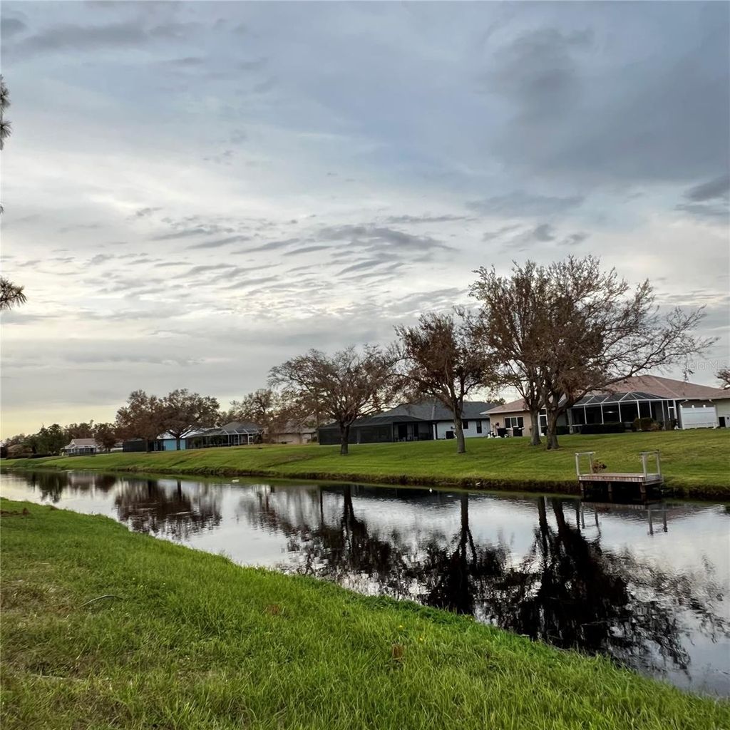 Photo of 717 Rotonda Circle, Rotonda West, FL 33947 (MLS # A4627190)