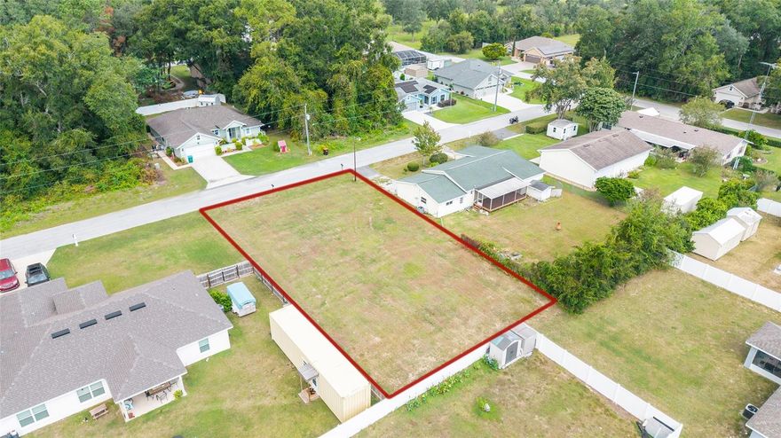 This Land can be purchased as a PACKAGE DEAL with the residence located next door. Discover an exceptional building opportunity in the highly desirable Orange Blossom Hills community! This generous quarter-acre parcel presents the perfect foundation for crafting your dream home amidst the serene natural beauty of Summerfield.

Property Highlights:

Prime Location: Situated in the sought-after Orange Blossom Hills neighborhood
Spacious Quarter-Acre Lot: Ample space for your custom home design
Tranquil Setting: Surrounded by natural beauty and peaceful surroundings
Excellent Accessibility: Just minutes from local amenities, major highways, parks, and scenic lakes
Growing Community: Positioned in an area experiencing steady growth and development
Investment Potential:
Whether you're planning to build your forever home or seeking a strategic real estate investment, this vacant land offers tremendous potential. The combination of location, size, and community appeal makes this an outstanding opportunity to secure your place in this flourishing Summerfield neighborhood.

Don't miss your chance to own a piece of Orange Blossom Hills – where natural tranquility meets convenient living!