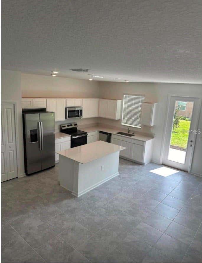 Photo of 157 Nine Iron Drive, Davenport, FL 33896 (MLS # S5156048)