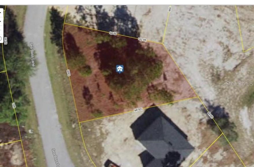 vacant land in growing poinciana, with new construction coming up next door and on the same street.