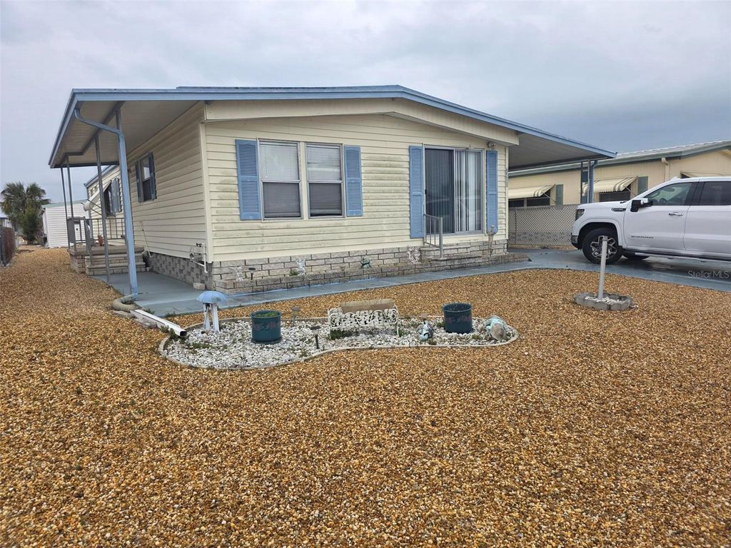 Photo of 7406 Stillwater Drive, Hudson, FL 34667 (MLS # OM720469)