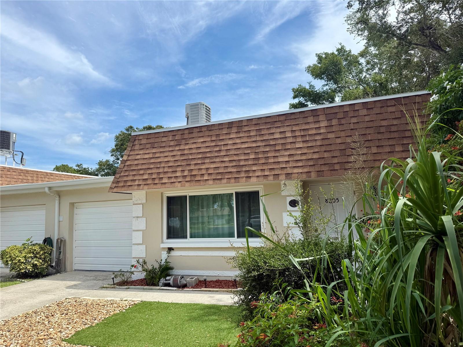 Vendome Village over 55+ Community - Don’t settle for the rest- Come see the Best!
Beautifully updated, move-in ready Villa, perfect for maintenance-free living. Softly used unit, as owners live out of state. Many updates: Newer panel, heater, AC, appliances, flooring, baths, 2025 new roof. New hurricane impact windows 2023, no prior flooding or hurricane damage. Tastefully redone, plus tons of closet space, including a 3 door bedroom closet, a walk-in closet, a linen closet, plus a coat closet at entry, and your own garage.
This end unit features an attached garage and offers a stunning view of the greenway and a neighboring lake, providing ample privacy and no neighbor-sharing walls. Imagine stepping out and being greeted by serenity. Whether you’re seeking a second sunny home or your primary residence, this quaint villa holds everything you need. Conveniently located, Paradise awaits you! Beaches, Dining, Shopping, SAM’s Club, and the Tampa Airport within distance.
Community features club house, pool, shuffle board; maintenance fees include new 2025 roof, water, sewer, trash, internet, cable, plus exterior maintenance, management, insurance, and much more…