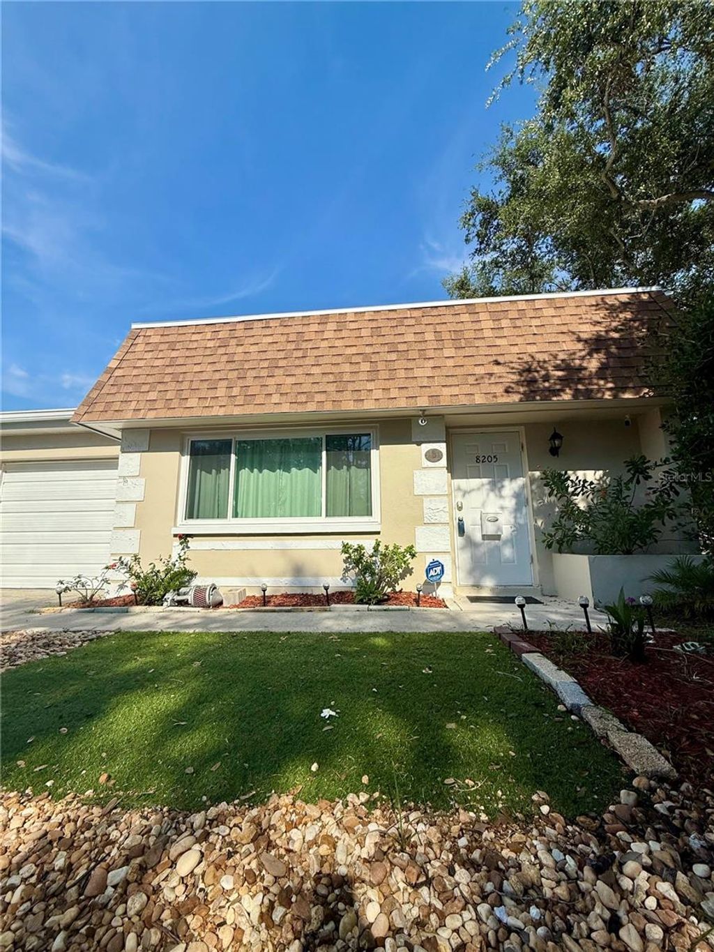 Photo of 8205 Burgundy Drive N #8205, Pinellas Park, FL 33781 (MLS # A4662341)