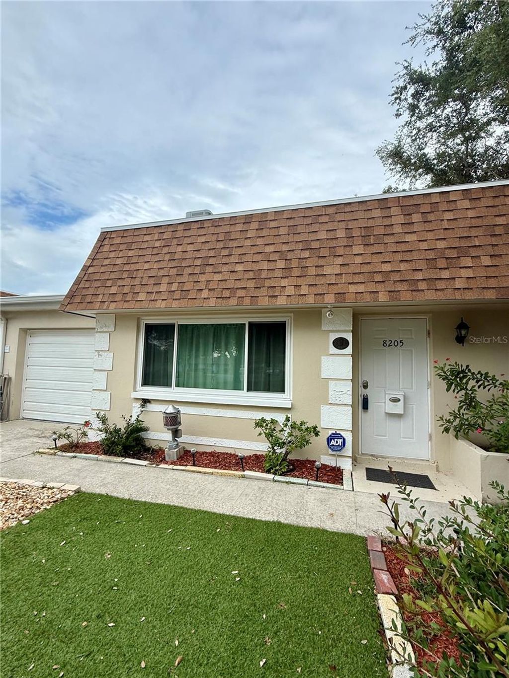 Photo of 8205 Burgundy Drive N #8205, Pinellas Park, FL 33781 (MLS # A4662341)