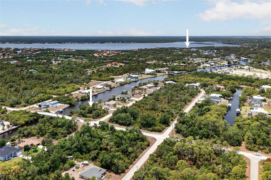 INCREDIBLE WATERFRONT OPPORTUNITY ON AN OVERSIZED CORNER LOT! Welcome to 13517 Palau Circle in Port Charlotte—a rare chance to build your dream home on a BEAUTIFUL WATERFRONT LOT offering approximately .42 ACRES of space in a peaceful residential setting.

Perfectly positioned on a CORNER LOT along a QUIET STREET, this property provides added privacy, flexibility for future home design, and exceptional curb appeal potential. With its oversized dimensions, there’s ample room to create the ultimate Florida lifestyle retreat with space for a custom home, pool, outdoor entertaining area, and more.

Enjoy tranquil waterfront views and the serene atmosphere that makes Southwest Florida living so desirable. Whether you’re looking to build a full-time residence, seasonal getaway, or investment property, this lot offers the ideal combination of LOCATION, SPACE, and POTENTIAL.

Conveniently located near shopping, dining, golf courses, parks, and beautiful Gulf beaches, you’ll enjoy both privacy and accessibility. Plus, Port Charlotte’s growing popularity and waterfront lifestyle continue to make it one of Southwest Florida’s most attractive places to live and invest.

If you’ve been searching for the perfect WATERFRONT LOT with extra space and a prime location, this is an opportunity you won’t want to miss. Drive by today and start planning your future in paradise!