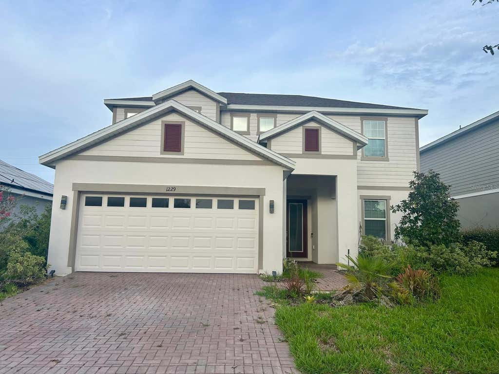 Photo of 1229 Hendon Loop, Davenport, FL 33837 (MLS # L4964089)